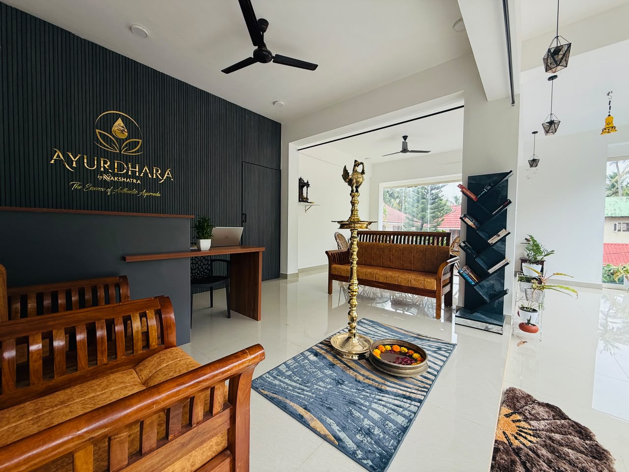 Ayurdhara by Nakshatra reception wall and welcome desk