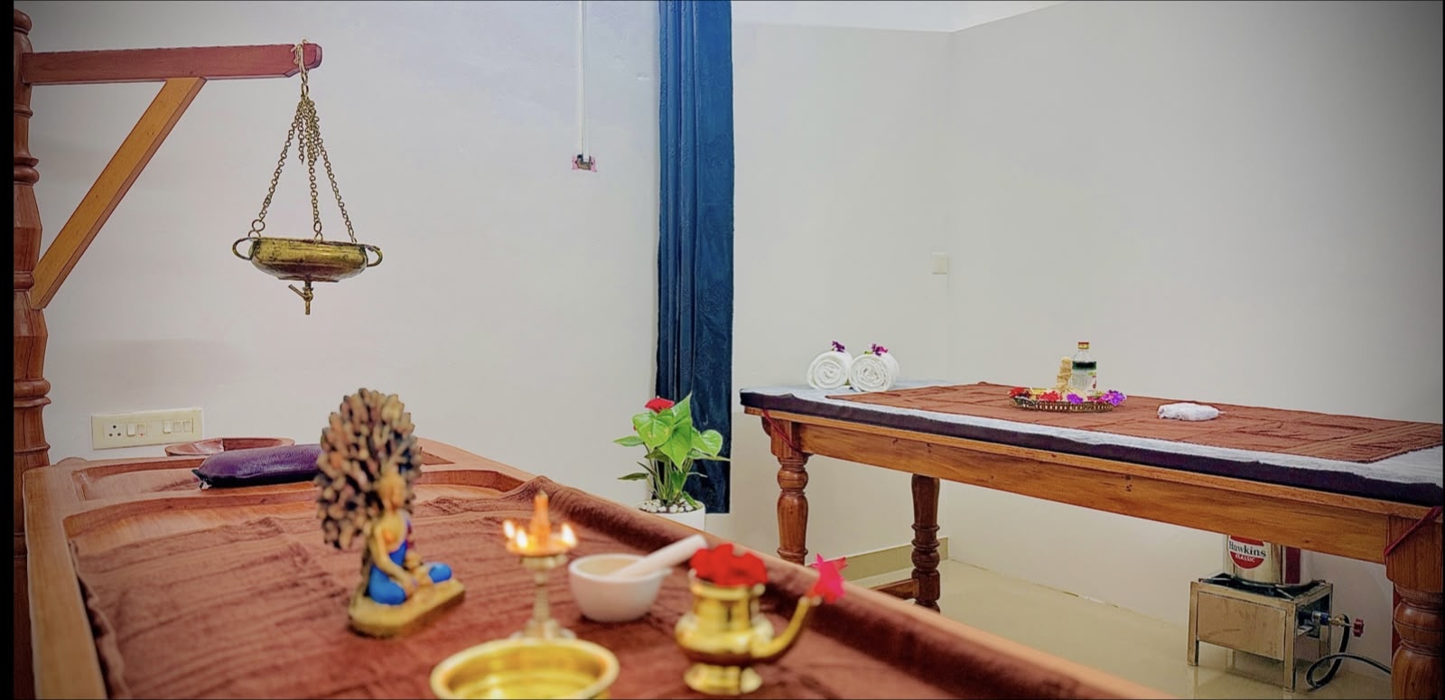 Relaxing Ayurvedic spa treatment with aromatic oils and soft candlelight