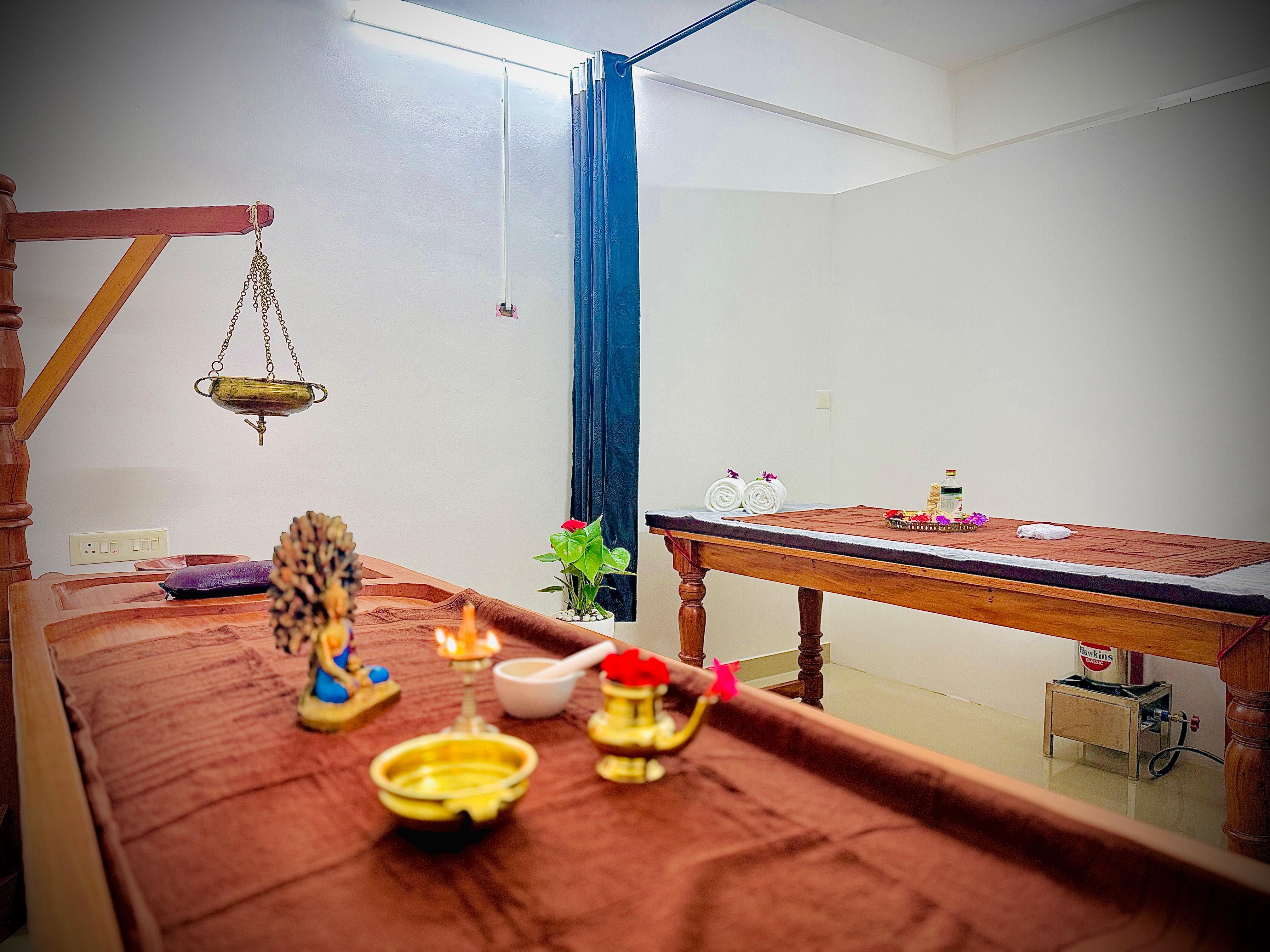 Client enjoying a soothing head and shoulder Ayurvedic massage.