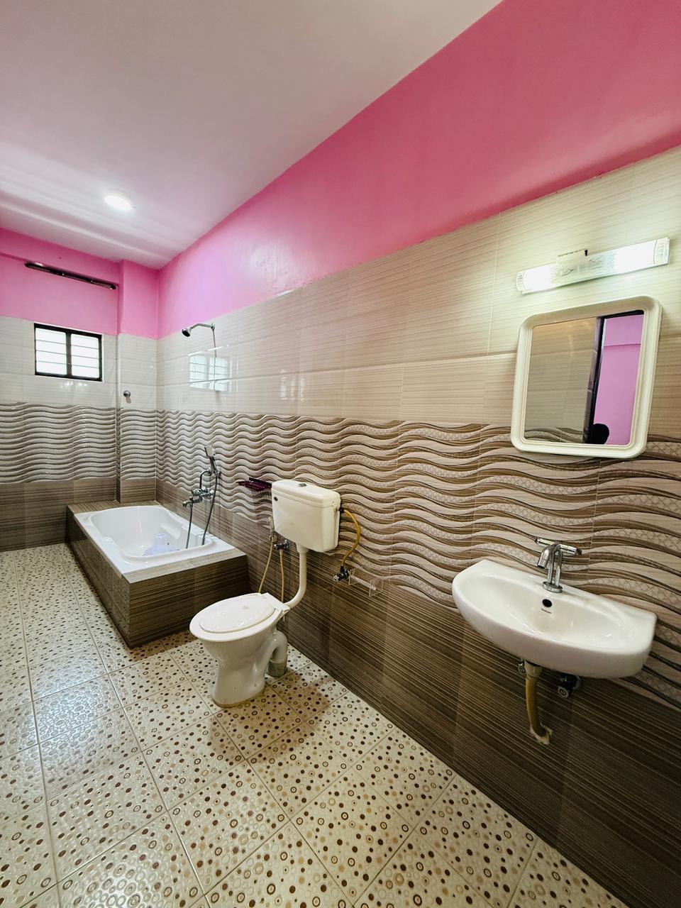 Private bathroom with bathtub for extended stay guests